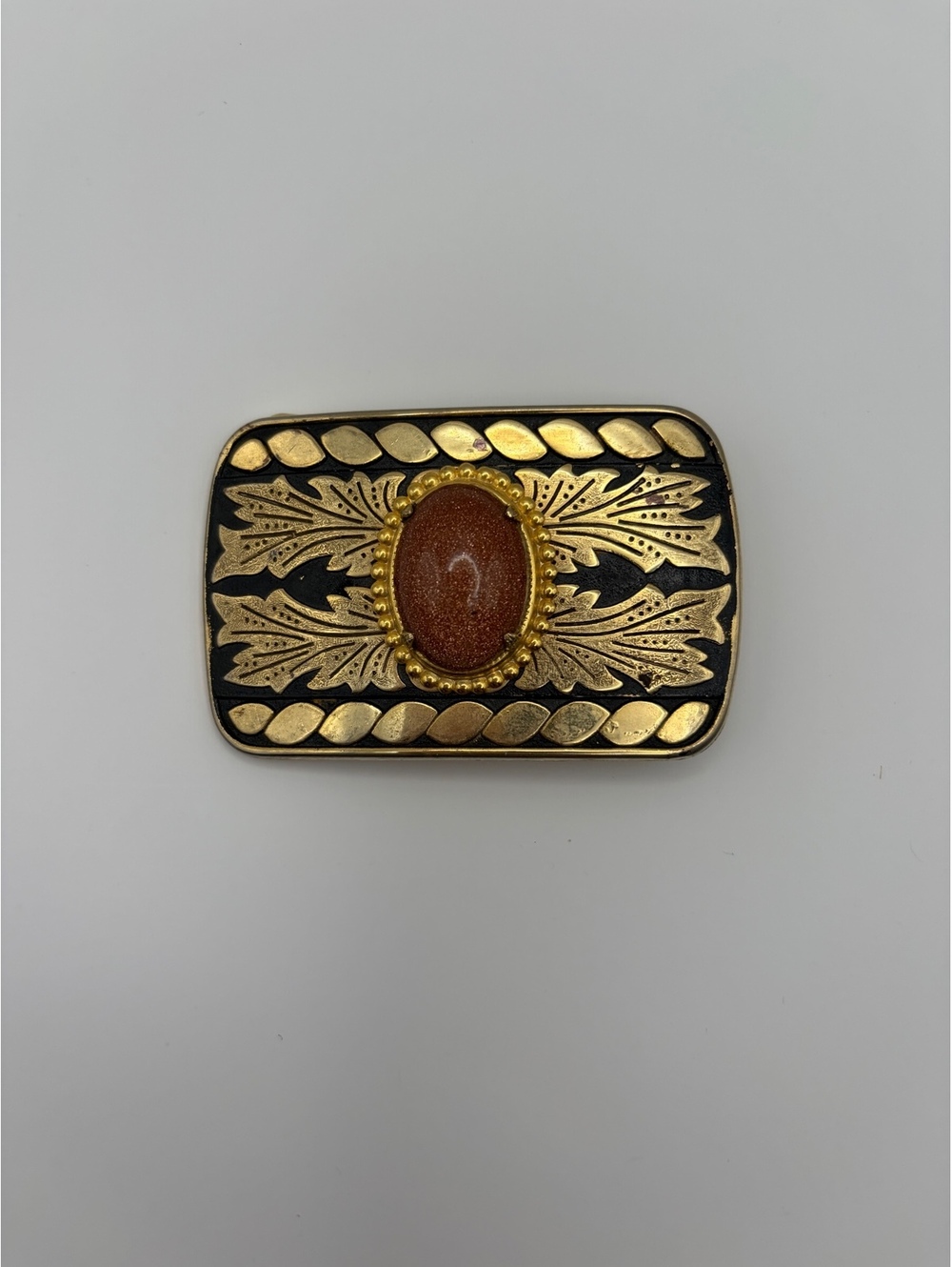 Vintage Gold-Tone Belt Buckle with Brown Oval Stone and Leaf Design, Approx. 3"x